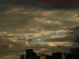 Blue Sky and Late Day Sun Leaking Through Over Boston